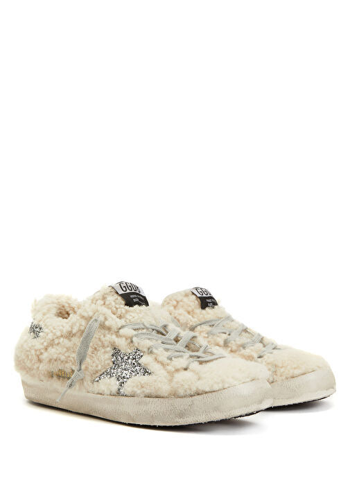 GOLDEN GOOSE
Shearling-panel sneakers