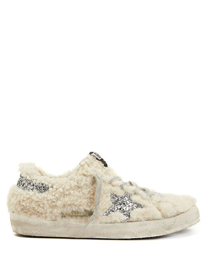 GOLDEN GOOSE
Shearling-panel sneakers