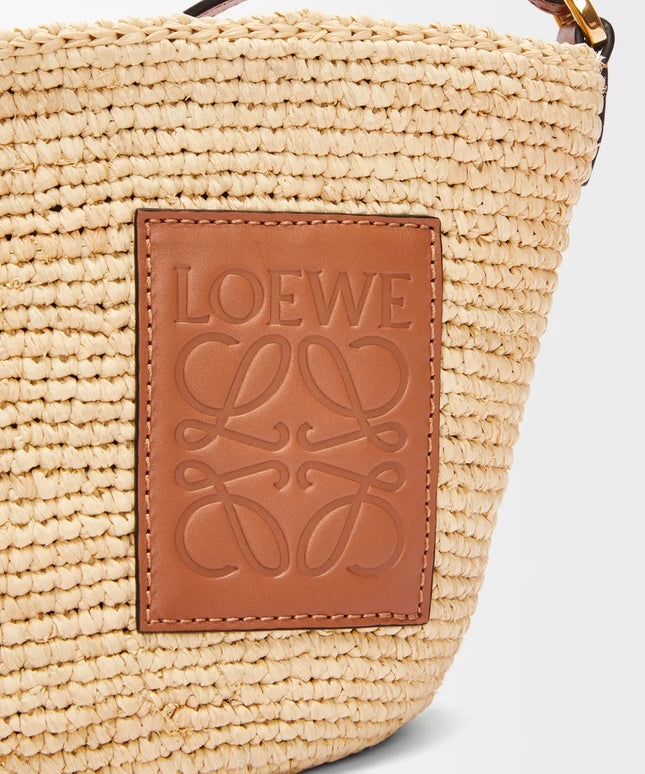 LOEWE Slit pochette bag in raffia and calfskin