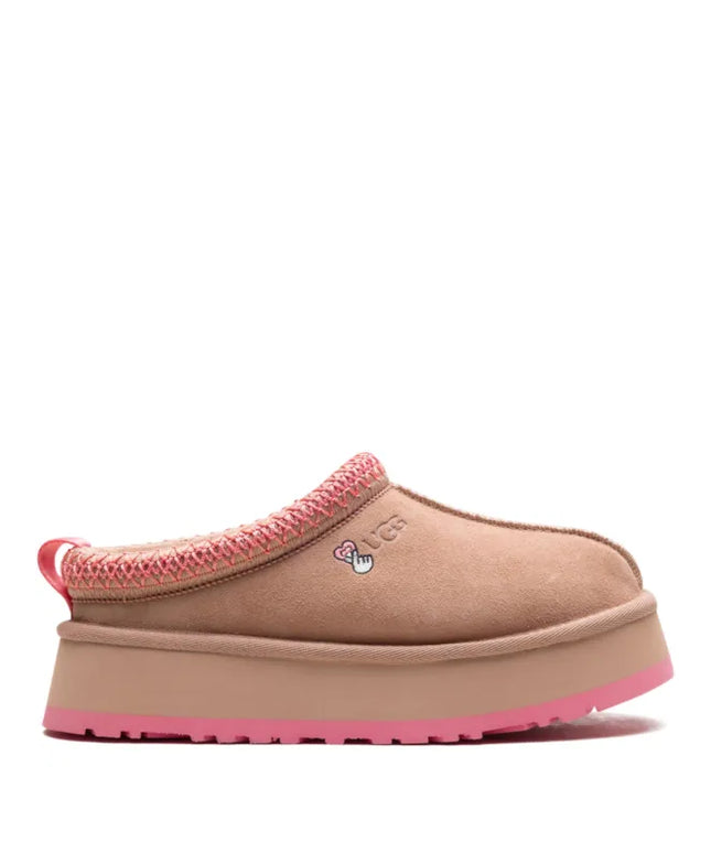 UGG
logo-embroidered shearling ear muffs