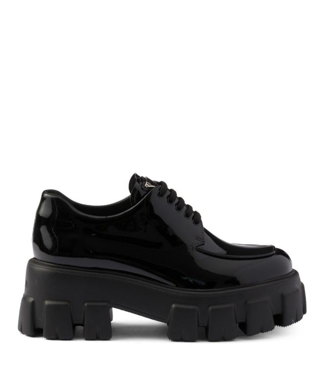 Prada
Monolith patent leather lace-up shoes