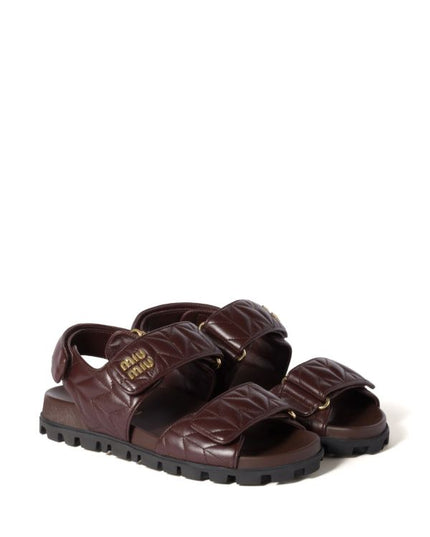 Miu Miu
Sporty matelassé leather sandals