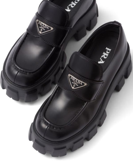 Prada
Monolith 55mm leather loafers