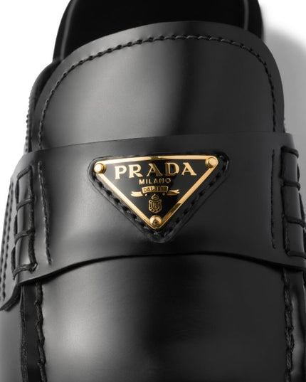 Prada
brushed leather mules