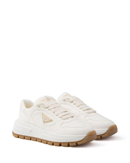 Prada
triangle-logo leather sneakers