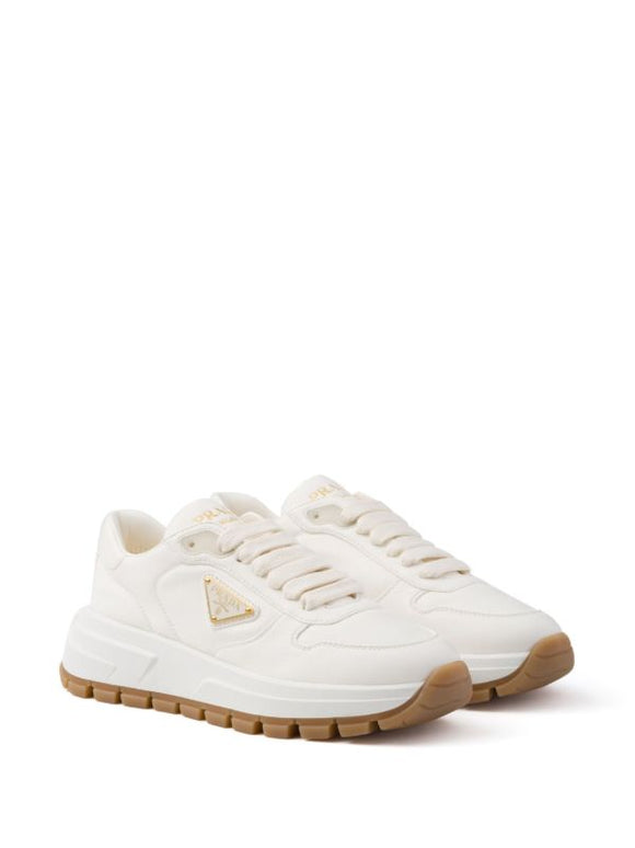 Prada
triangle-logo leather sneakers