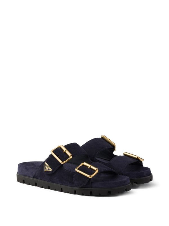 Prada
buckle suede slides