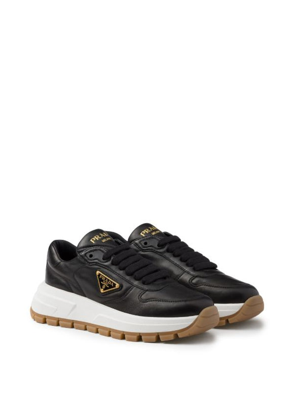 Prada
triangle-logo leather sneakers