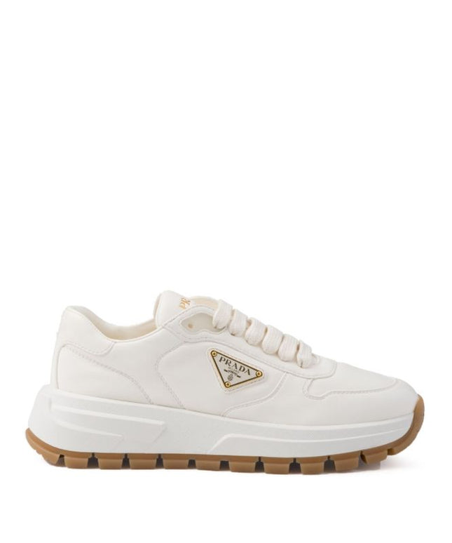Prada
triangle-logo leather sneakers