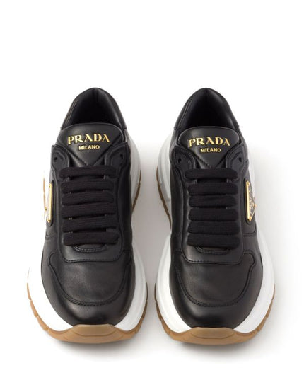 Prada
triangle-logo leather sneakers