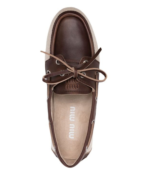 Miu Miu
canvas loafers