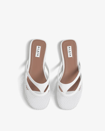 INFRADITO FLAT MULES IN FISHNET AND LEATHER