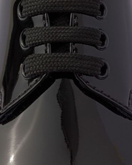 Prada
Monolith patent leather lace-up shoes