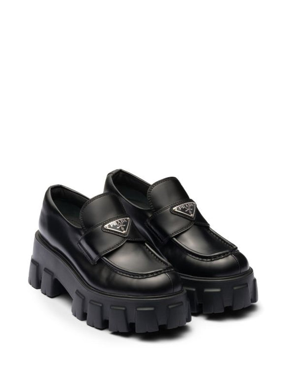 Prada
Monolith 55mm leather loafers