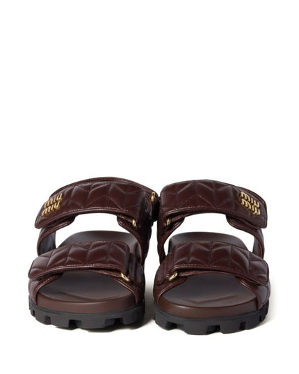 Miu Miu
Sporty matelassé leather sandals