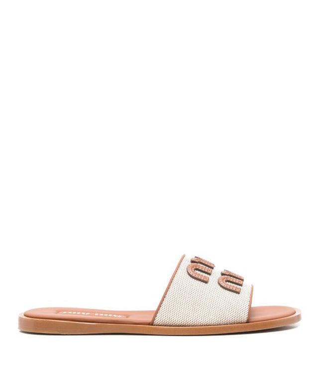 Miu Miu
appliqué-logo slides