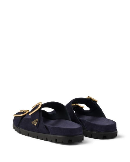 Prada
buckle suede slides
