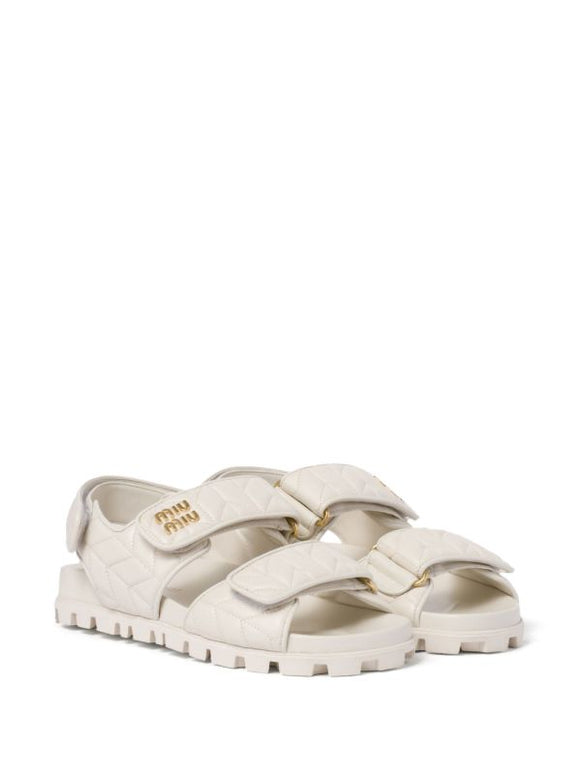 Miu Miu
matelassé logo-plaque sandals