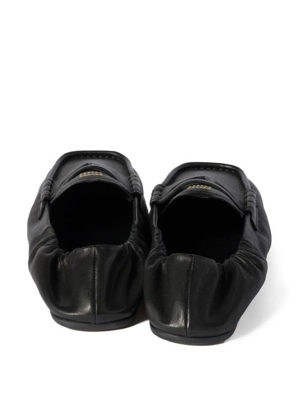 Miu Miu
embossed-logo loafers