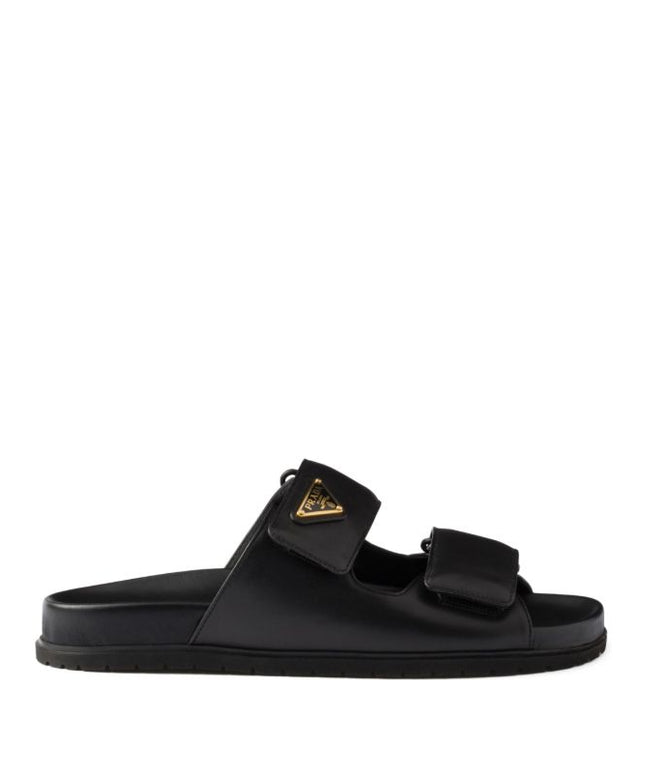 Prada
touch-strap leather sandals