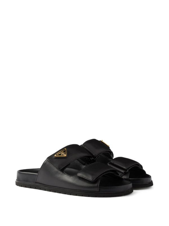 Prada
touch-strap leather sandals