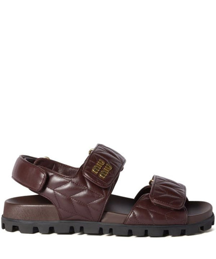 Miu Miu
Sporty matelassé leather sandals