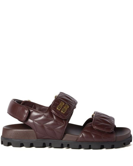 Miu Miu
Sporty matelassé leather sandals