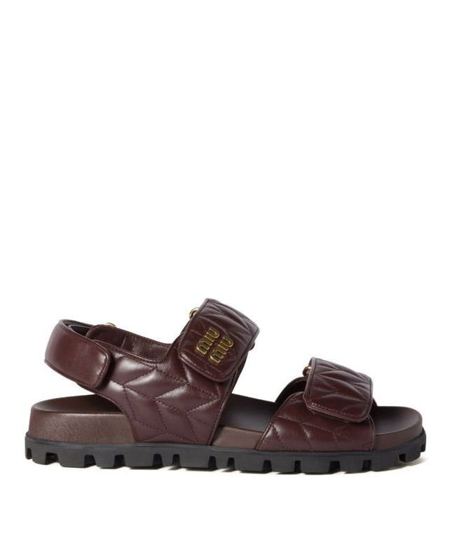 Miu Miu
Sporty matelassé leather sandals