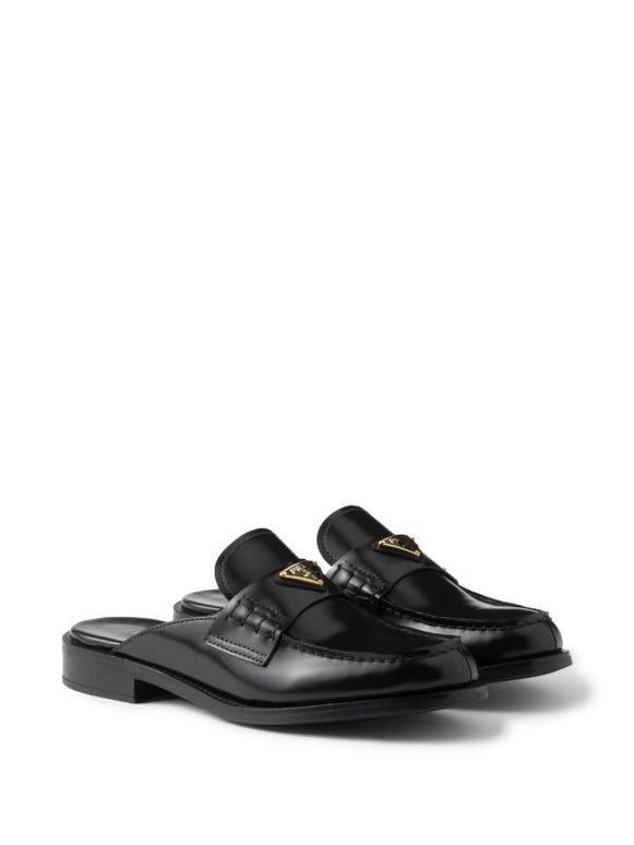 Prada
brushed leather mules