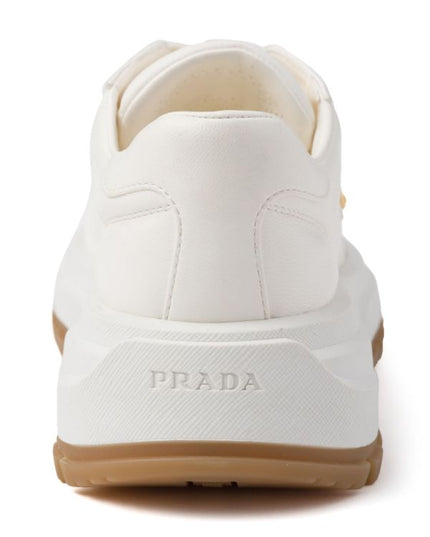 Prada
triangle-logo leather sneakers